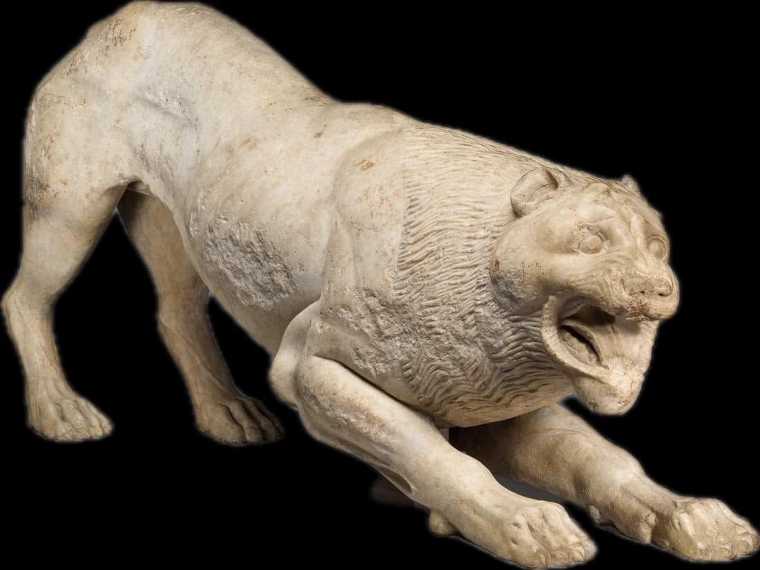 A marble statue of a crouching lion